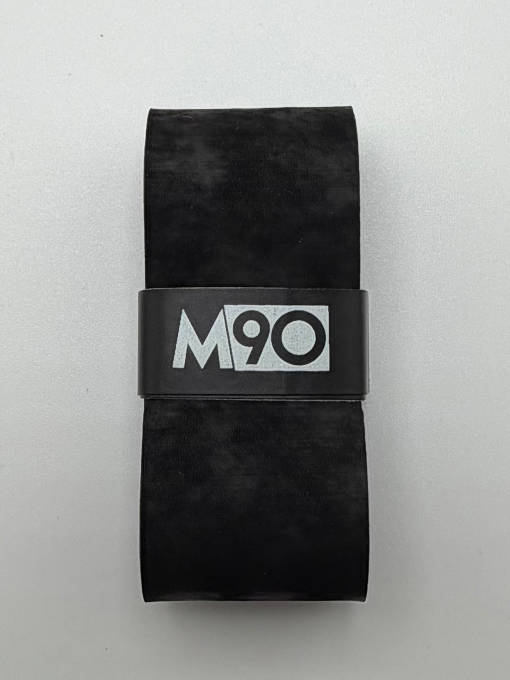 M90 MaxAbsorb tennis overgrip, black, texture close-up